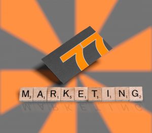 Making Social Media Work for Business. An image of the 77 Design Co orange and gray logo on an orange and gray background. 