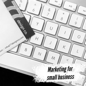 Growing Your Seasonal Business. An image in black and white of a 77 Design Co notepad and computer keyboard. 
